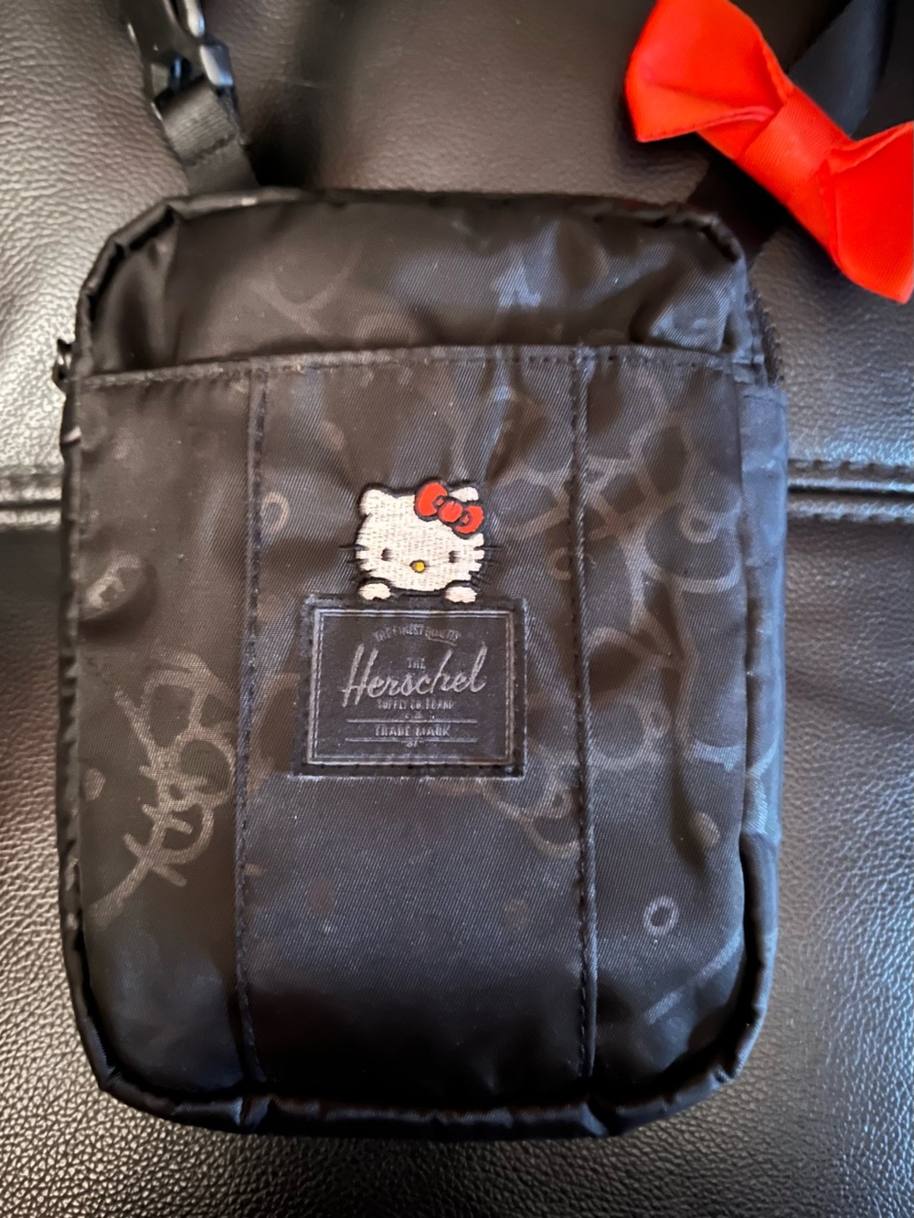 Herschel Supply Company Black Hello Kitty Shoulder Pouch with Red Bow Accent
